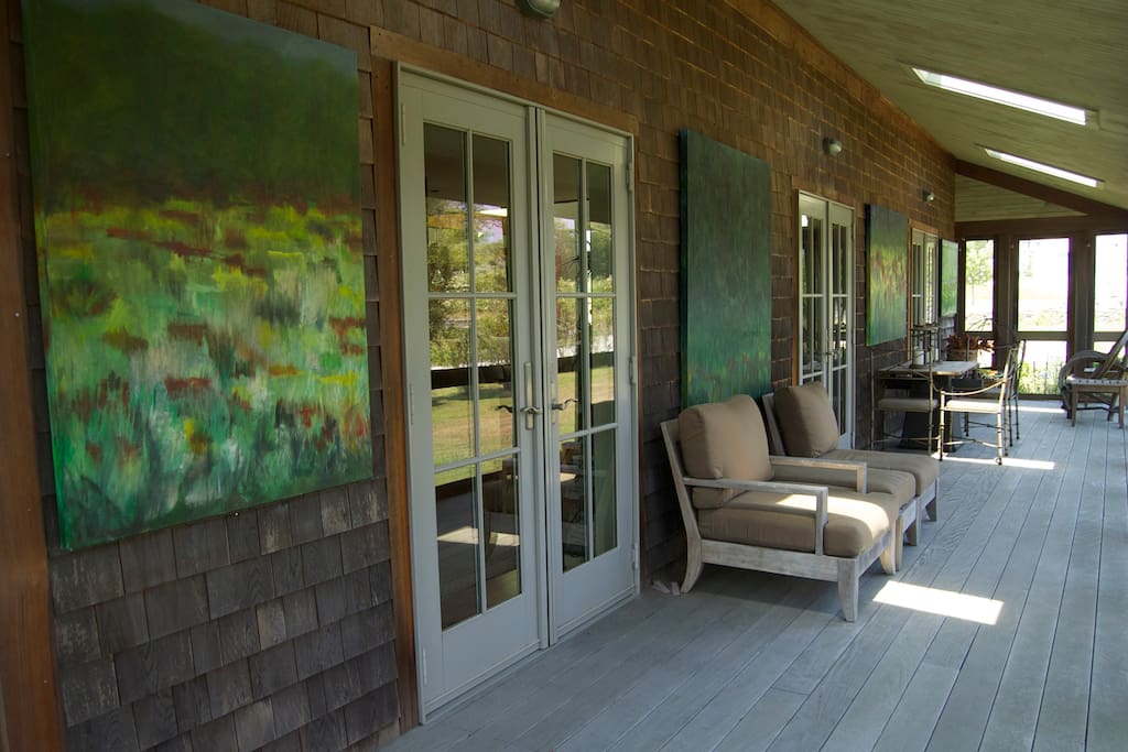 there r four french doors that lead to a wrap around porch for seating / dinning ... south side of porch