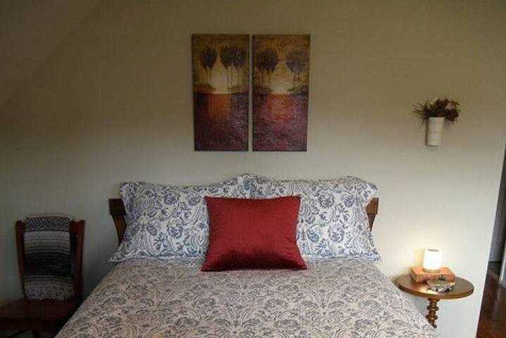 Relax in a French Courtyard Beneath Canopy Oaks!