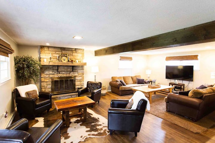 Basement living room. Plenty of room to unwind with family and friends! 