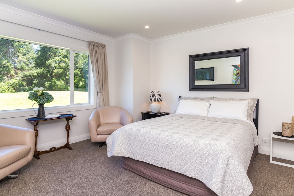 Bedroom One. Queen Bed.