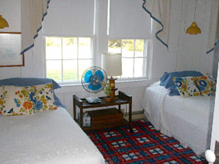 Bedroom #4 in North end of house has two twins