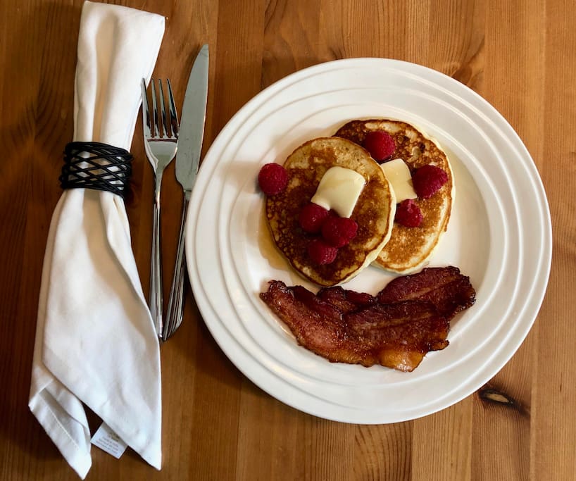 Banana pancakes with berries and Applewood bacon!