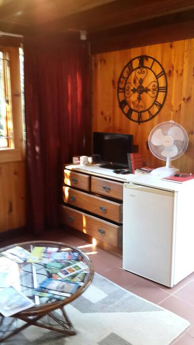 T.V. Bar fridge, fan, draws