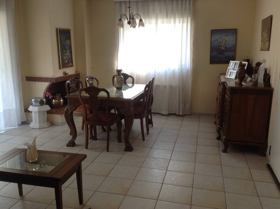 Dinning room facing fire place and large veranda. Sits 6 people