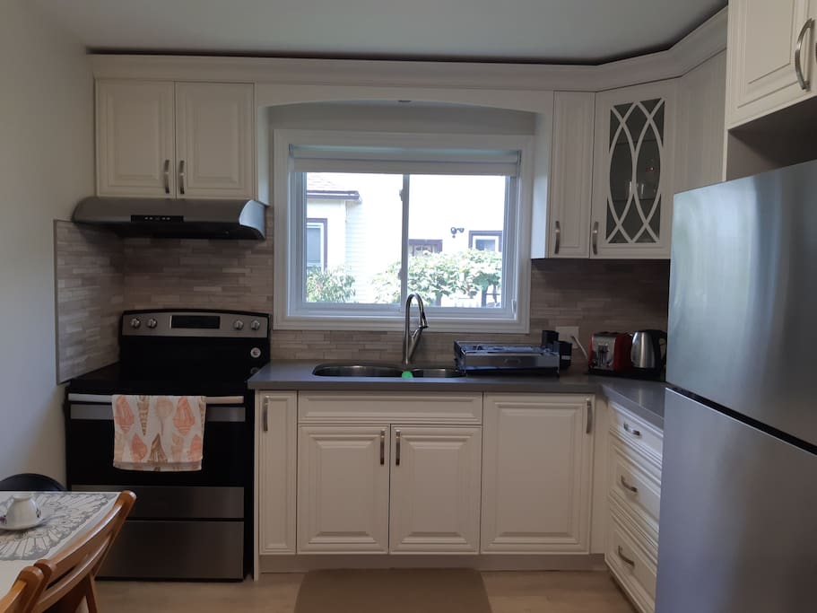 Full kitchen. Help yourself with coffee & tea and free bottled water in the fridge.