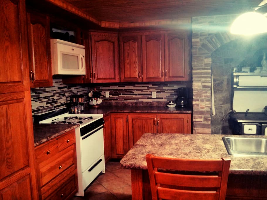 Kitchen with gas stove/oven.