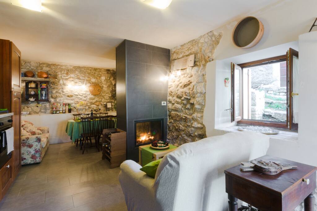 Ground Level - Living Room in front of fireplace/Piano Terra