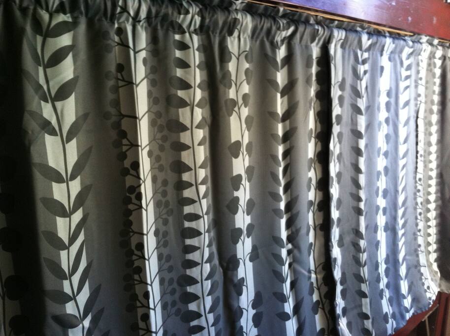 Privacy curtains closed.