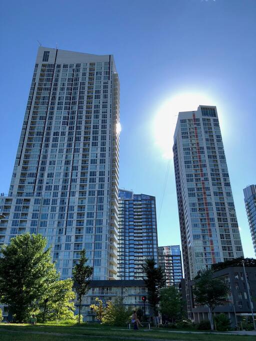 The condo building and its right across the street from a huge park!