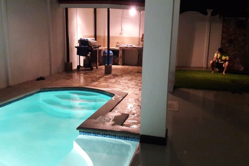 The outdoor cooking area and pool are nicely lit to host evening activities as well.
