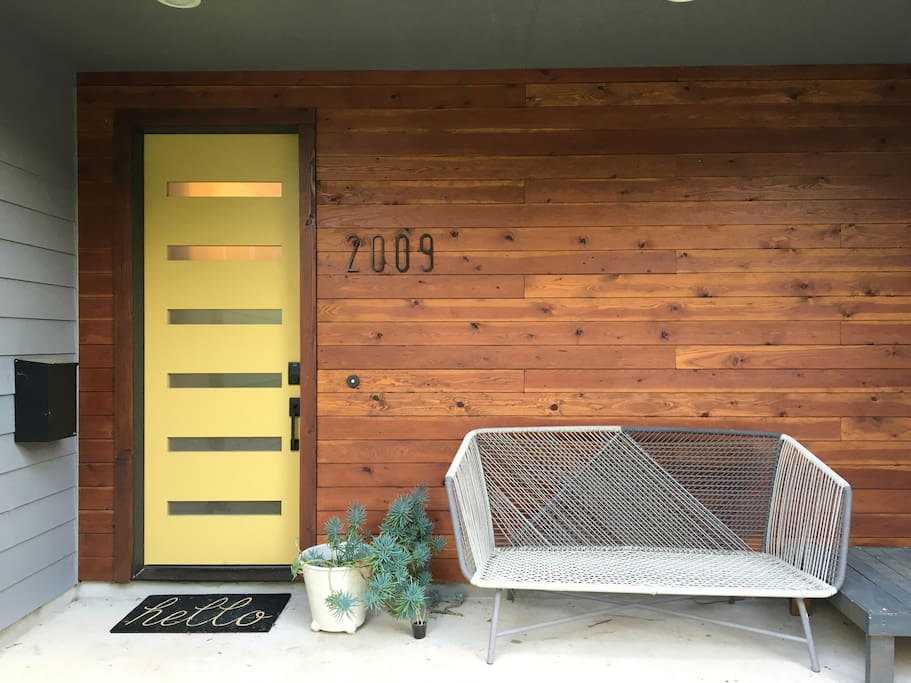 The house with the yellow door.