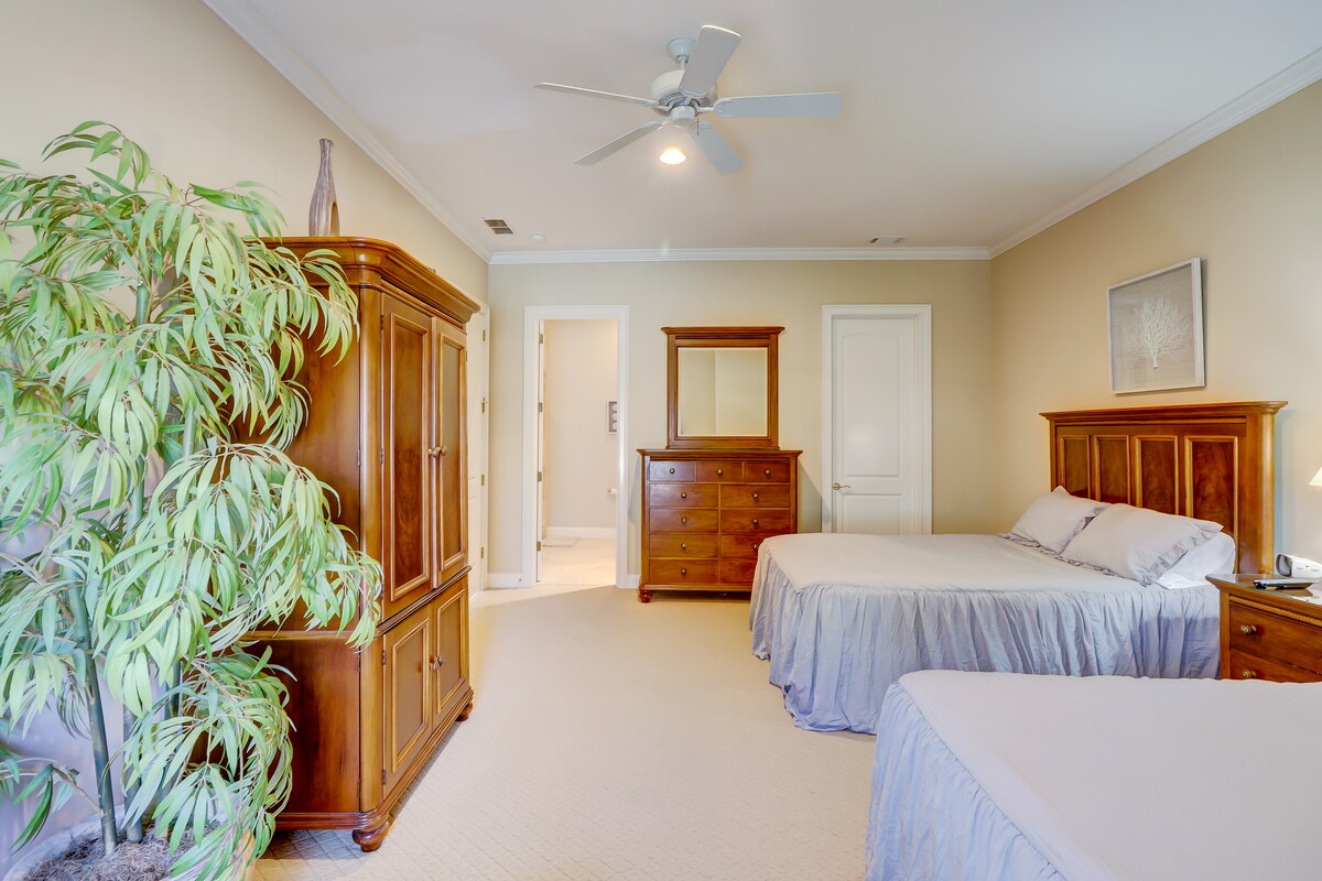 Door on left is ensuite bathroom and door on right is walk-in closet.