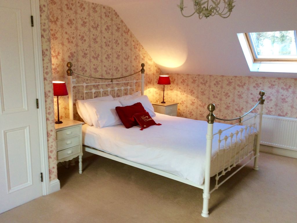 Upstairs bedroom with ensuite and walk in wardrobe area.