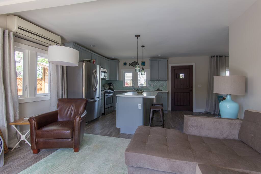 Living room flows nicely into the open kitchen. Ductless ac in this room only.