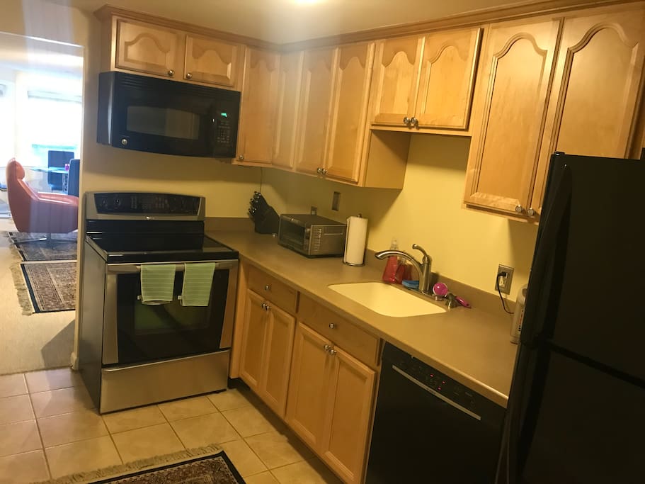 Updated and very clean kitchen with basic cooking supplies.
