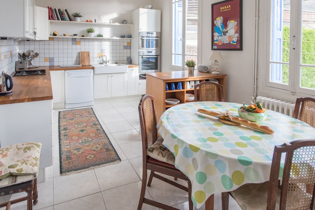 Big, spacious kitchen with dining table that extends to seat 8 people