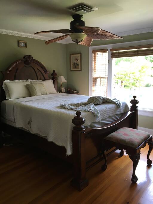 Master bedroom with ensuite bath. Beautiful picture window facing front of property.