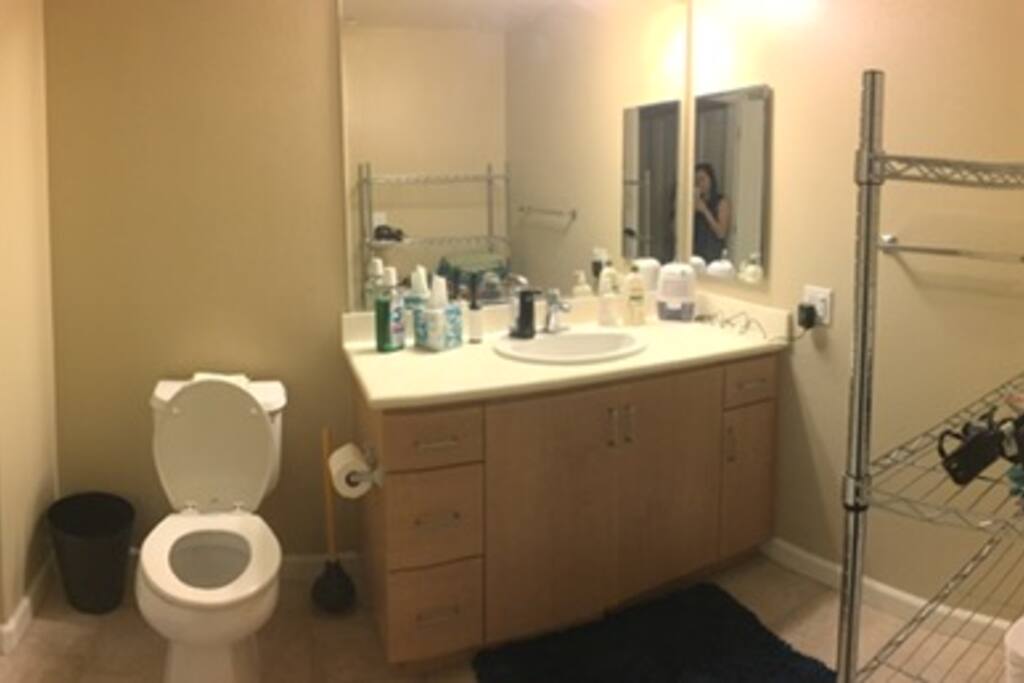 Your private bathroom, with towels and toiletries provided.