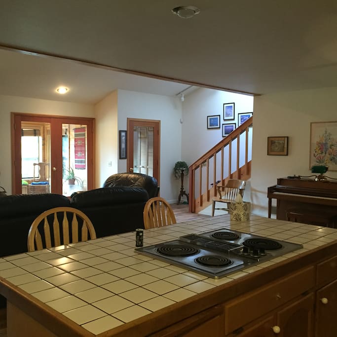 Entry, sunroom and stairs from kitchen