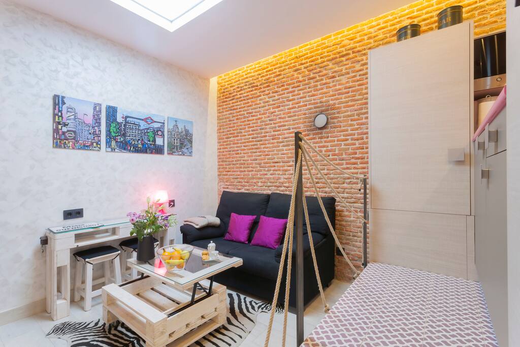 The skylight in the ceiling above the living room area gives it a beautiful lighting.