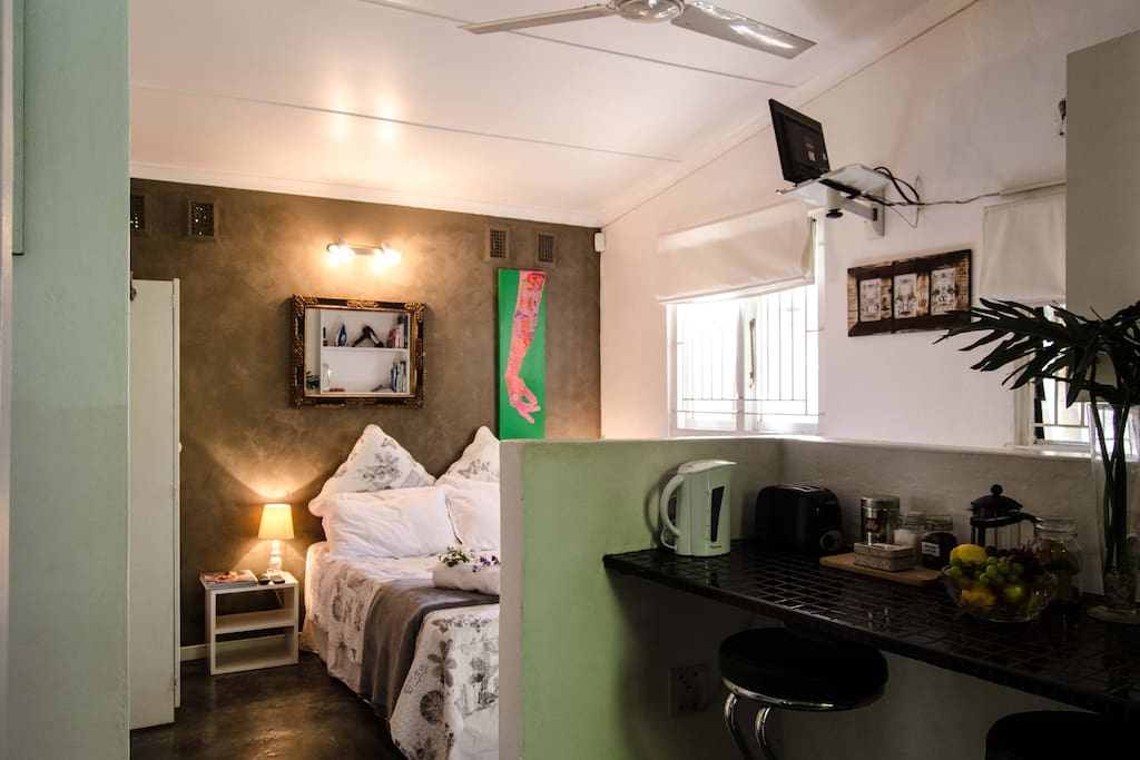 Kettle, toaster, coffee maker in reach of bed