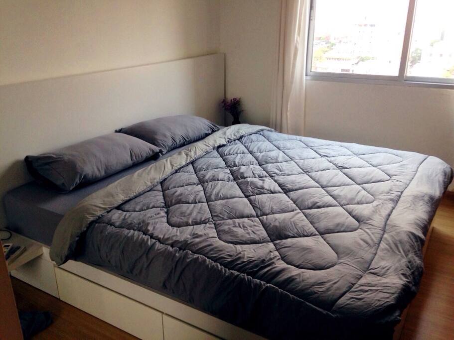 Bright and cozy bedroom with amazing view from the 11th floor.