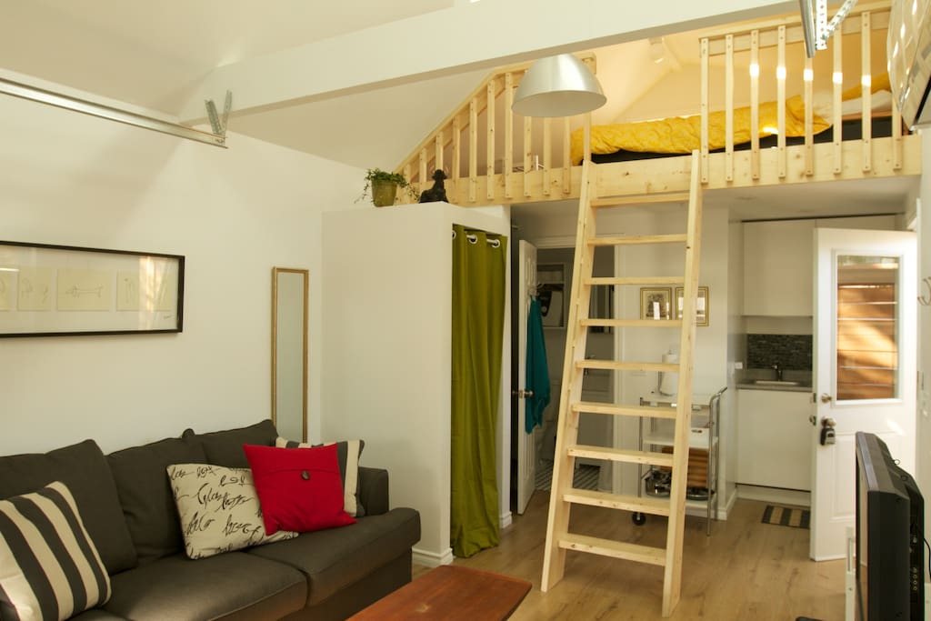 The stairs bring you to the sleeping loft.