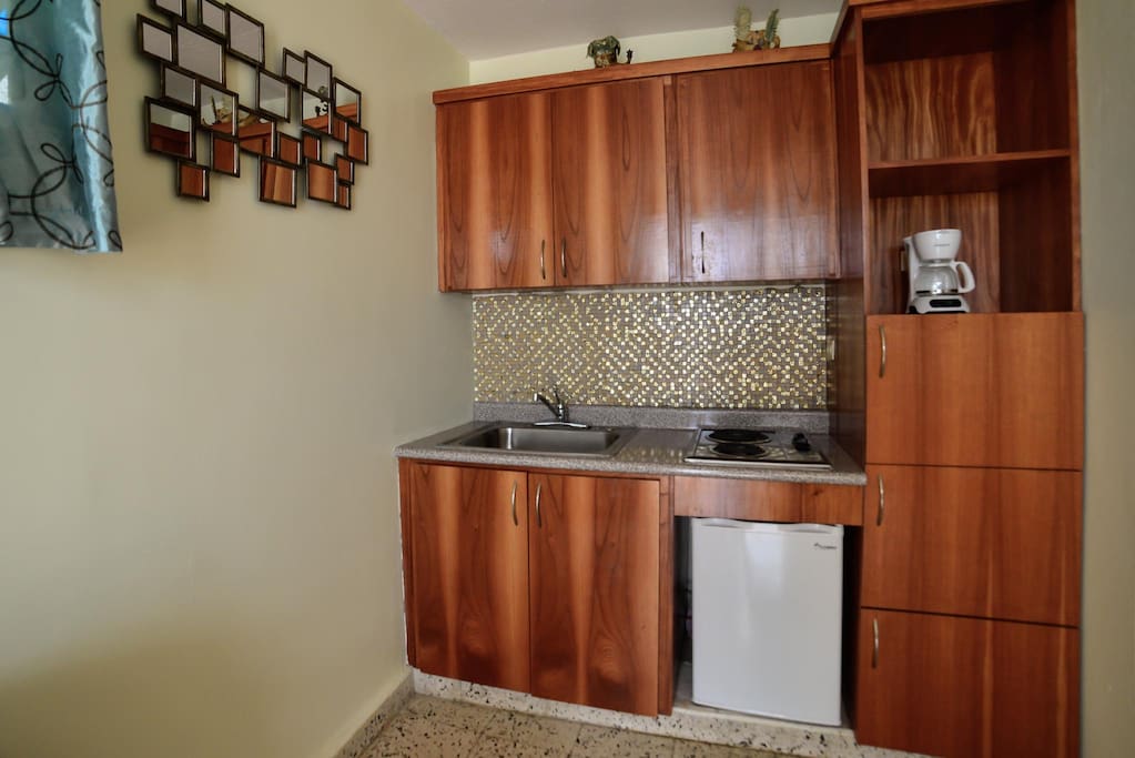 Efficiency kitchen with all you need to prepare simple meals and snacks