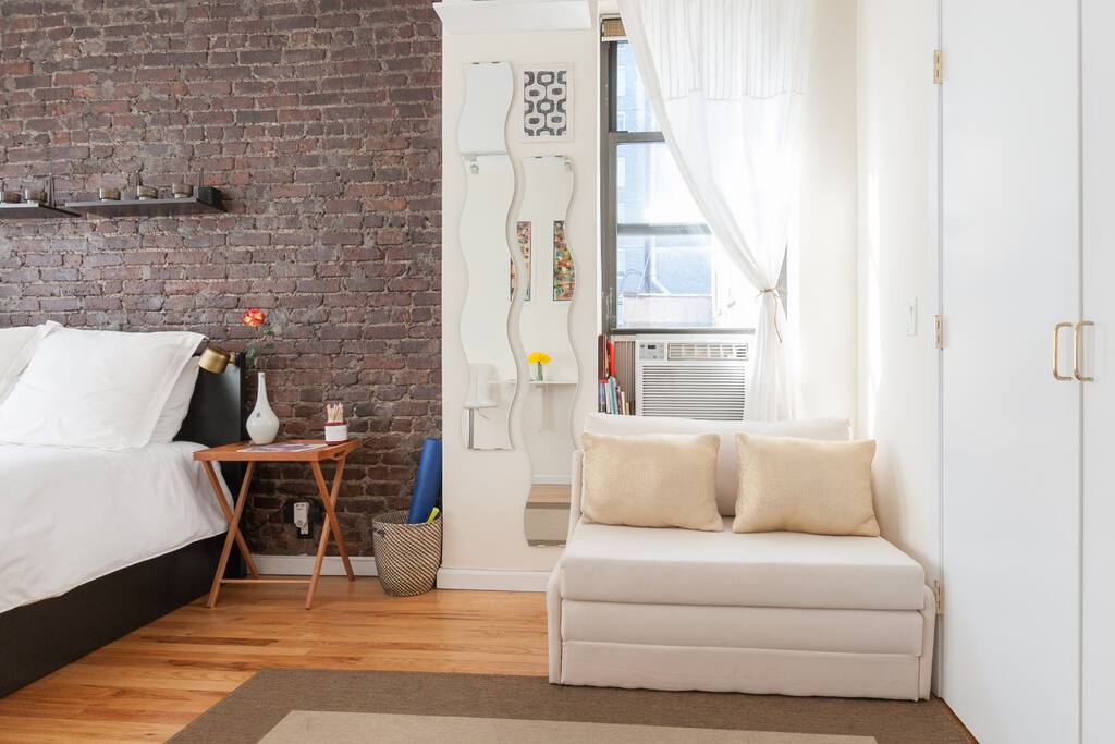 Sofa pulls out to a bed for additional guest.