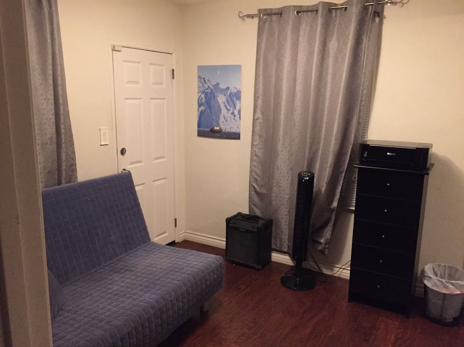 Private Room with queen size futon, dresser, and closet