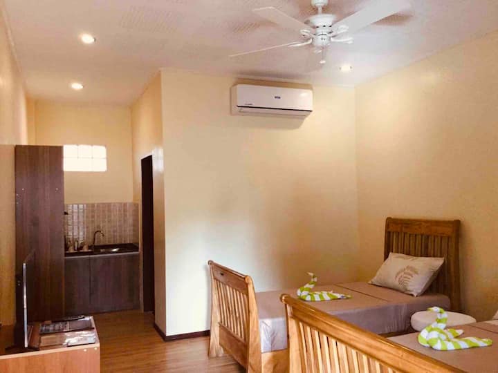 Aircondition og loftsventilator af delt type