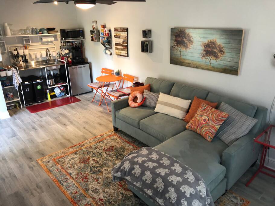 Cozy sofa. Queen pull out bed. Open concept.
