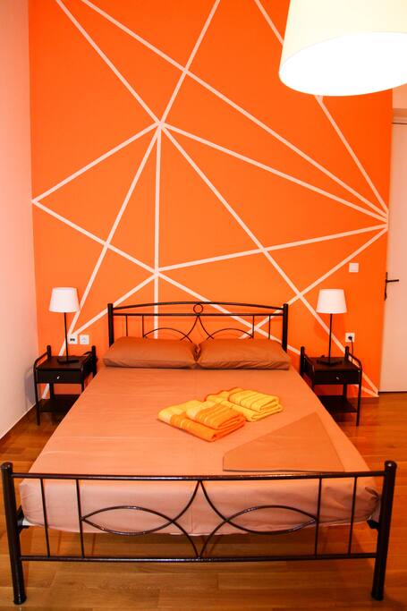 The room has a comfortable bed. Corner with a table and chairs where you can dine, drink coffee. The room has a small refrigerator