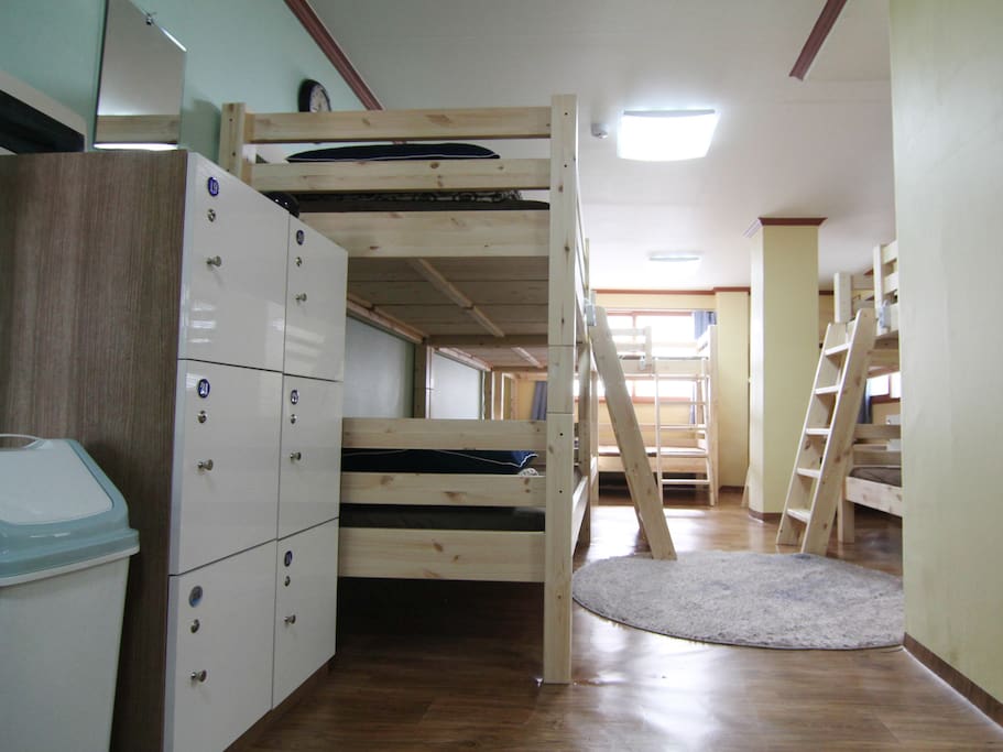 10 bed dormitory room for male with one bathroom.