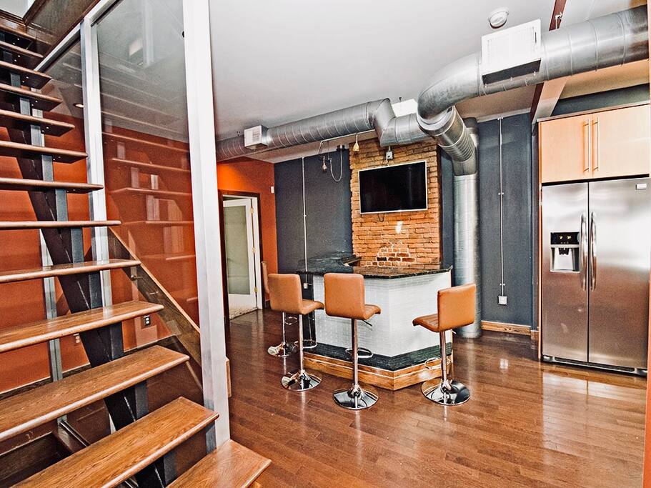 Open concept room connecting to spacious chefs kitchen.