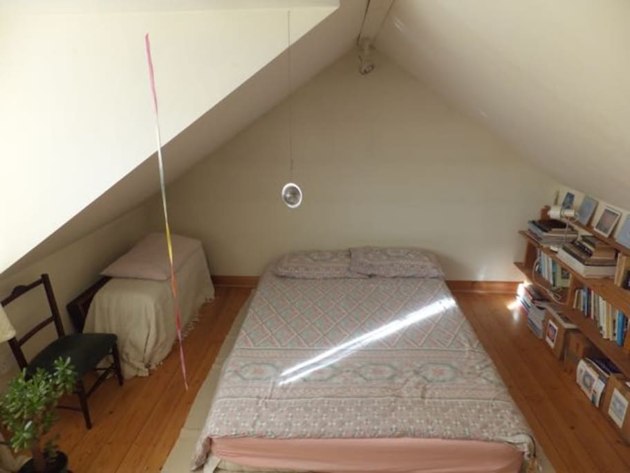 Couples might prefer upstairs with a double mattress. The room which is a loft conversion is open plan and opens directly onto the stairs. i.e. there is no door but there is privacy.
