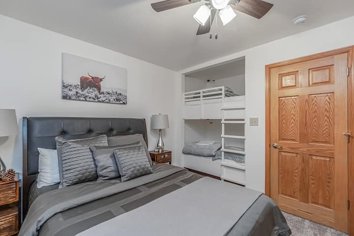 Perfect for a small family! Queen sized bed and a set of smaller bunkbeds-- idea for a family with small children.