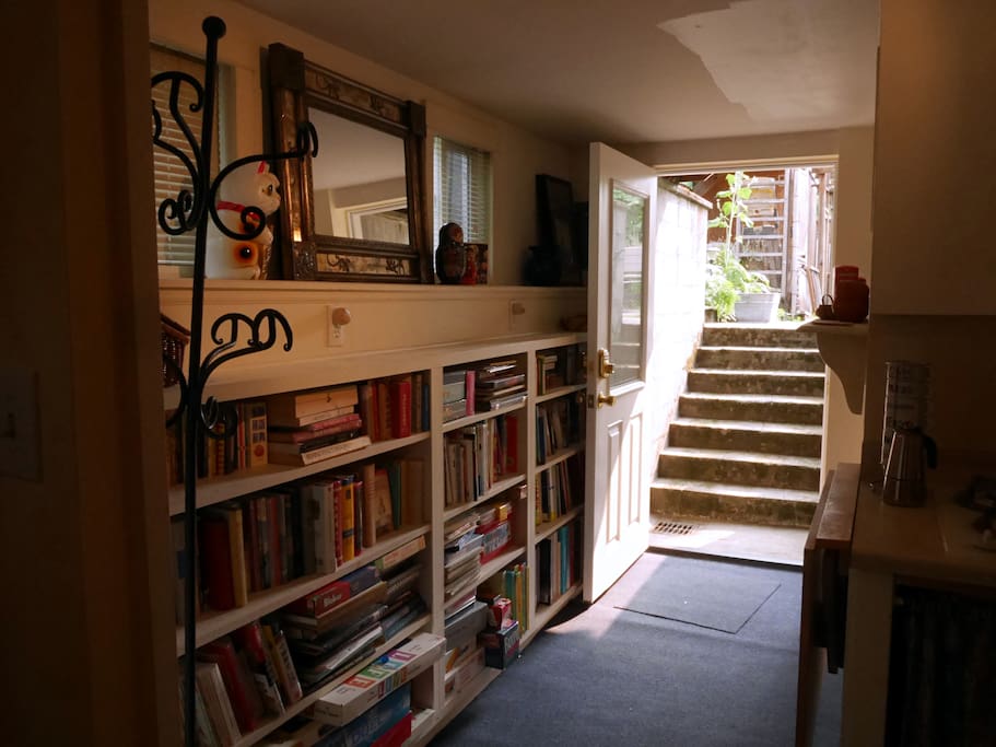 Enter our will-lit basement in-law unit from private entry in the backyard