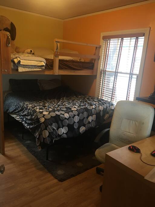 Bedroom with Bunk beds. Lower bed's mattress is a memory foam one, super soft.