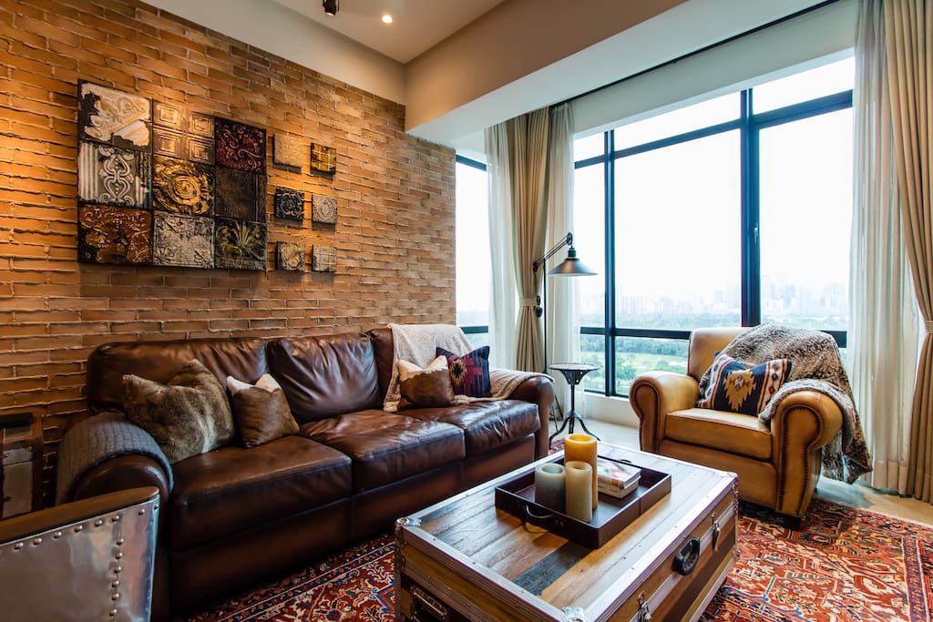 Relax and unwind in cozy and comfortable living room with Bose full entertainment system.