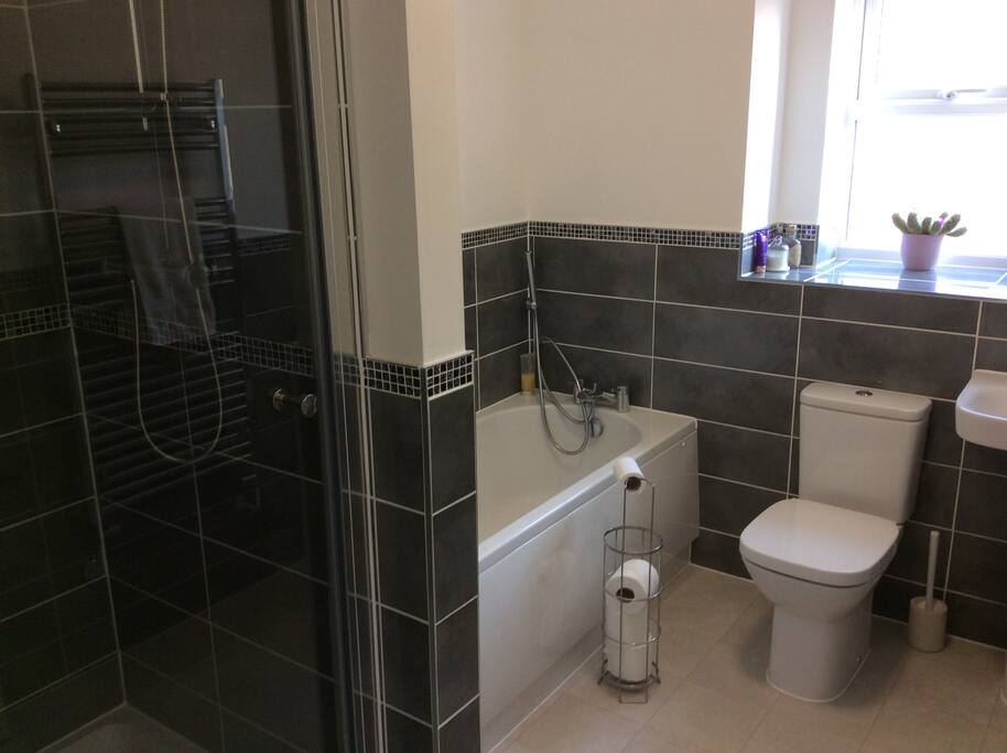 Four-piece bathroom suite with thermostatic shower, and plenty of hot water.
