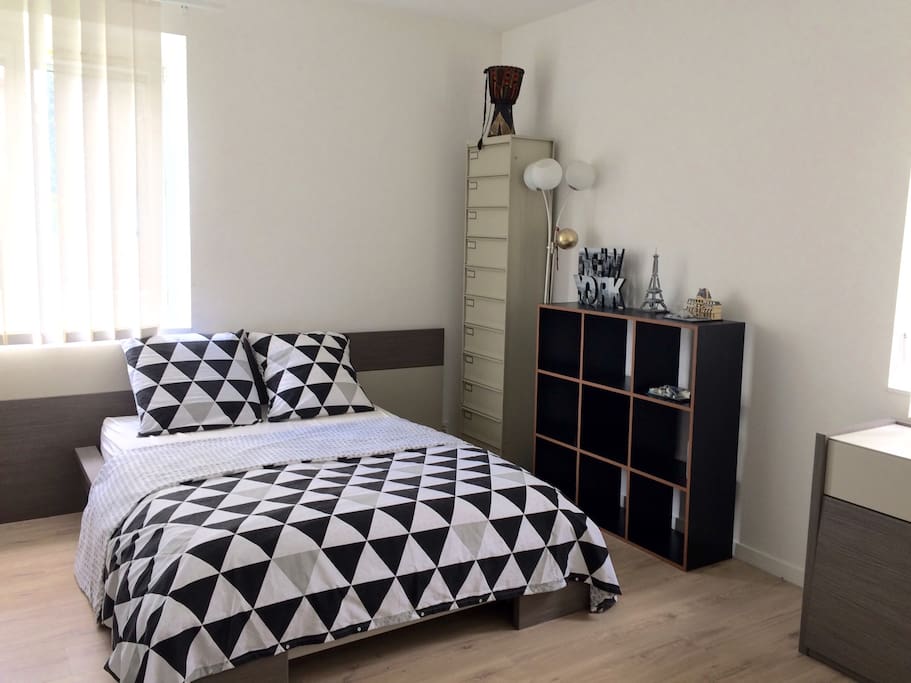Second Room with a big double bed ! + Cupboard and Chest of drawers and book storage furniture + Office table in each room