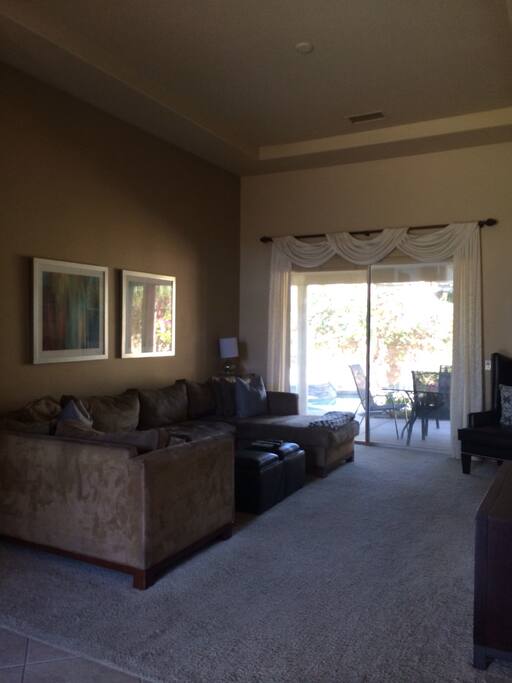 Main Living Room with 70 in TV and Netflix/ Cable .