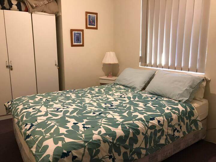 2nd bedroom with a comfortable queen bed 