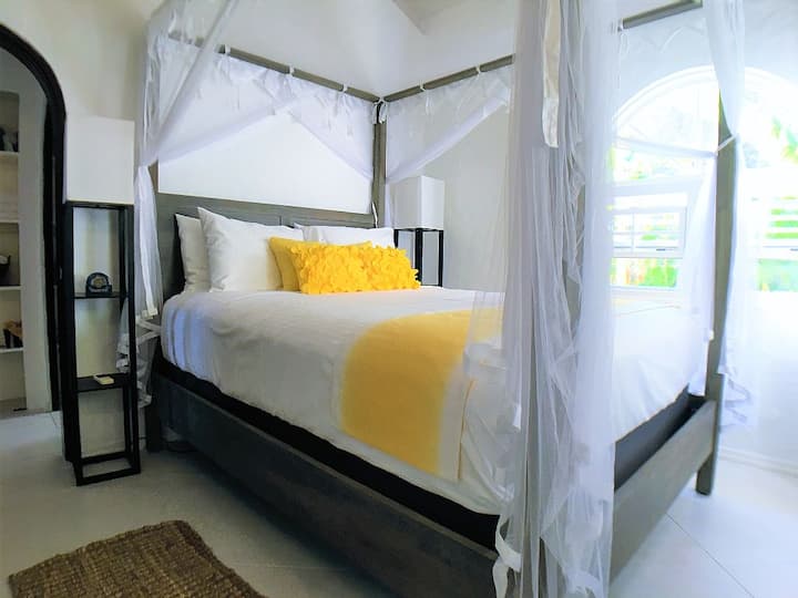 Bedroom #2. Queen canopy bed. AC and ceiling fan in every room.