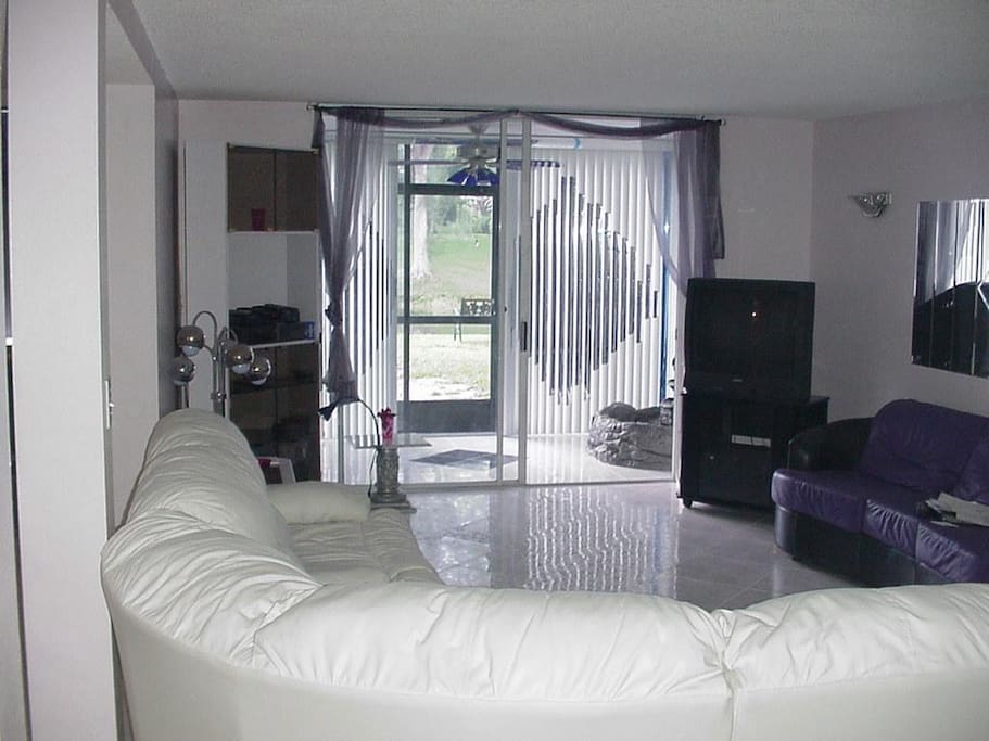 Sunken Living Room view to porch and exterior lake