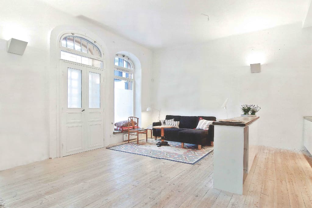 Original hardwood floors and high ceiling.