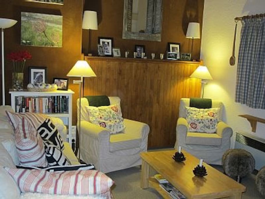 Sitting Room (with extra small-double folding bed behind the arm chairs)