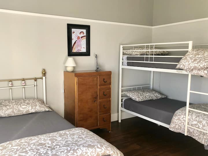 Second bedroom with 2 bunk beds and a single bed