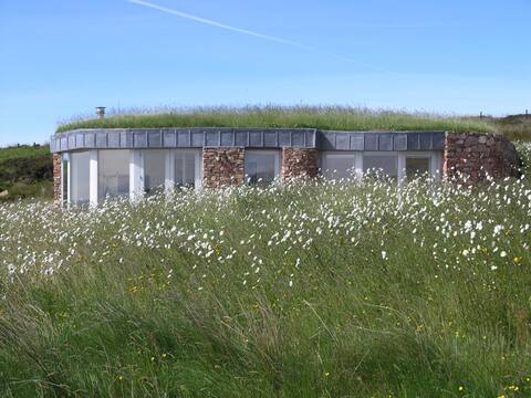 Turf roofed self catering lodge